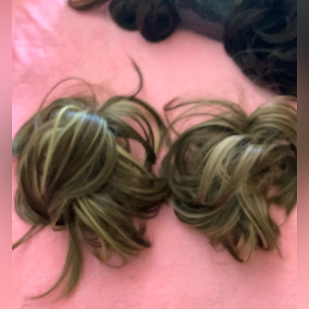 Two clip in hair extensions